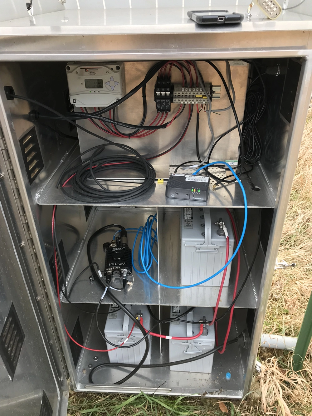 8 Stations are equipped with solar panel charged batteries to power the 40T Posthole and the Minimus digitiser, and with a cell modem to transmit the data to the network