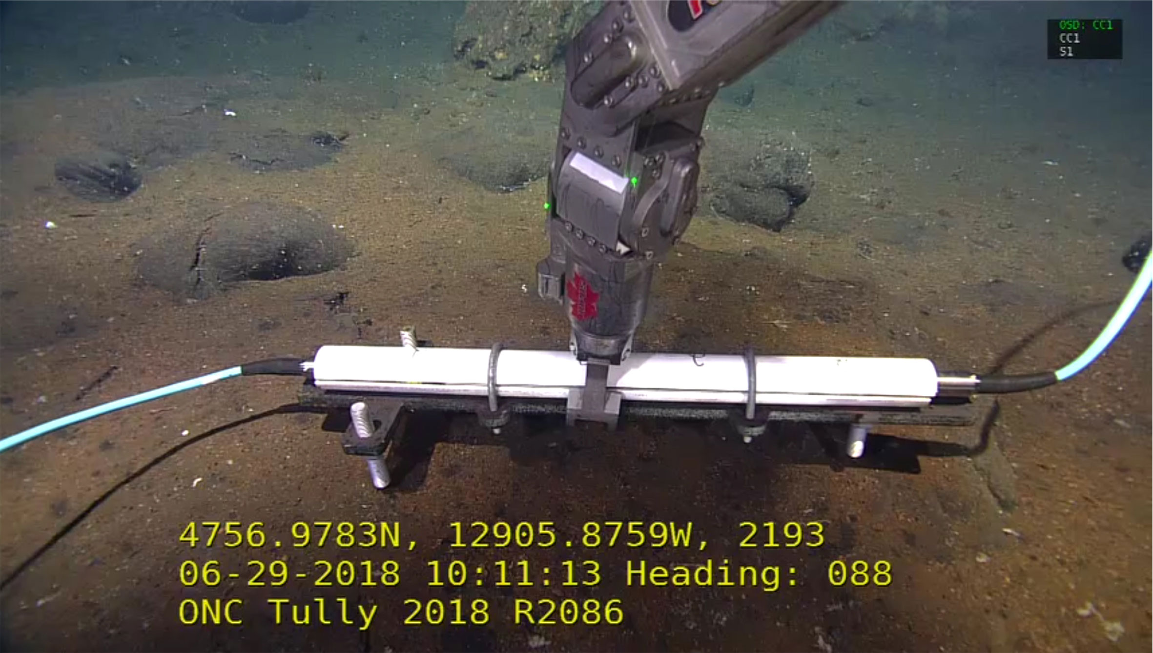 Güralp Maris Seismometer being placed in position at 2200m depth (Image courtesy of Ocean Networks Canada)