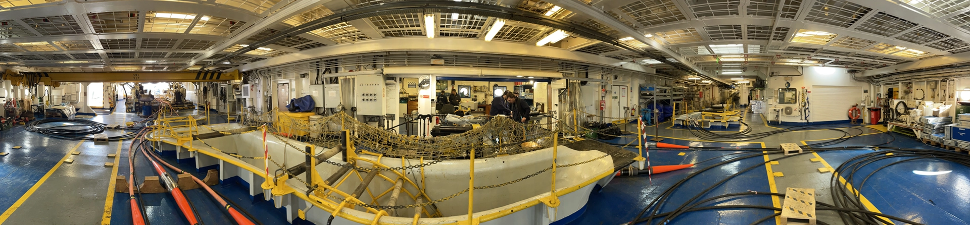  Panoramic photo of the ship’s cable-laying deck 